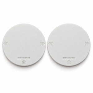 Pair of two white RV AC vent covers with recessed REMOVE lettering and double-chevron markings.