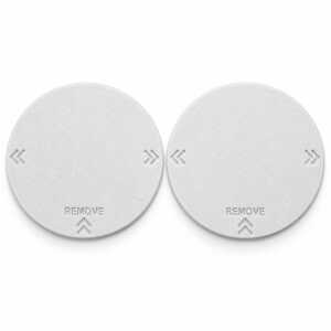 Pair of two white RV AC vent covers with recessed REMOVE lettering and double chevrons. Digitally edited product photo.